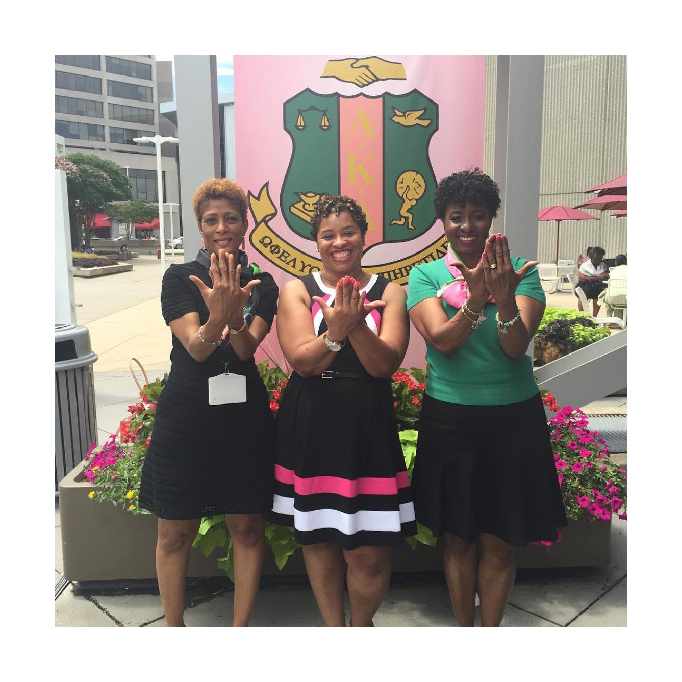 The Ladies of Alpha Kappa Alpha Sorority, Inc. Paint Atlanta Pink and Green